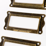 Typeset Bronze Label Holders w/ Mini Brads